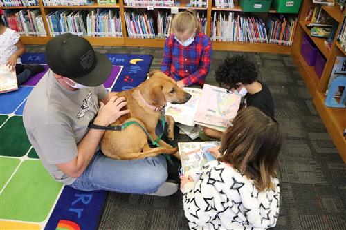 Dog with students